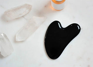 Gua Sha Therapy: Natural and Holistic Health Benefits for the Body, Face, and Mind